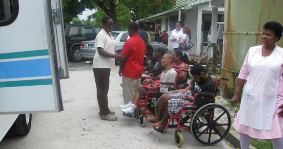 Residents waiting to get on to the new bus