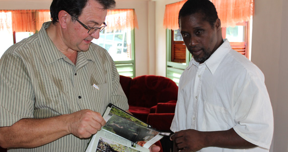 Deputy Mayor Mr. Vito Spatafora reading with Cheshire Home resident